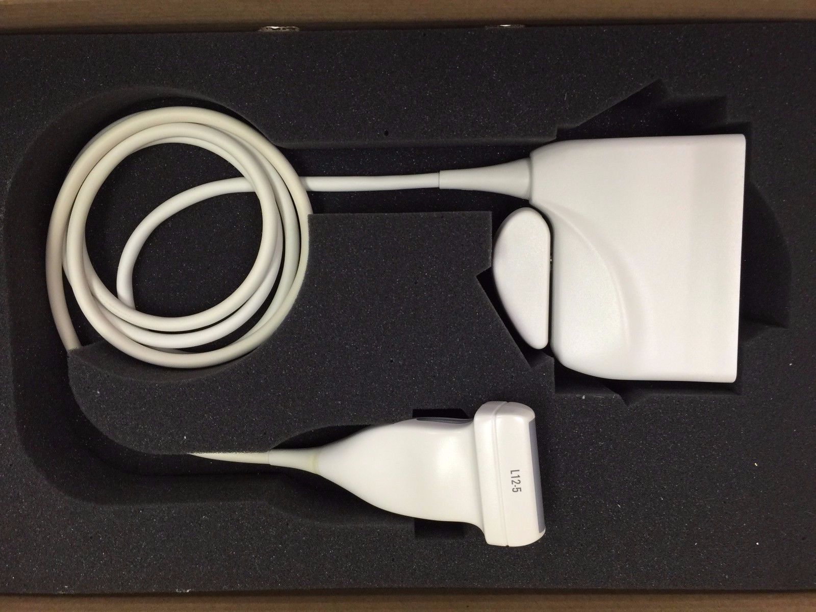 overhead probe in box