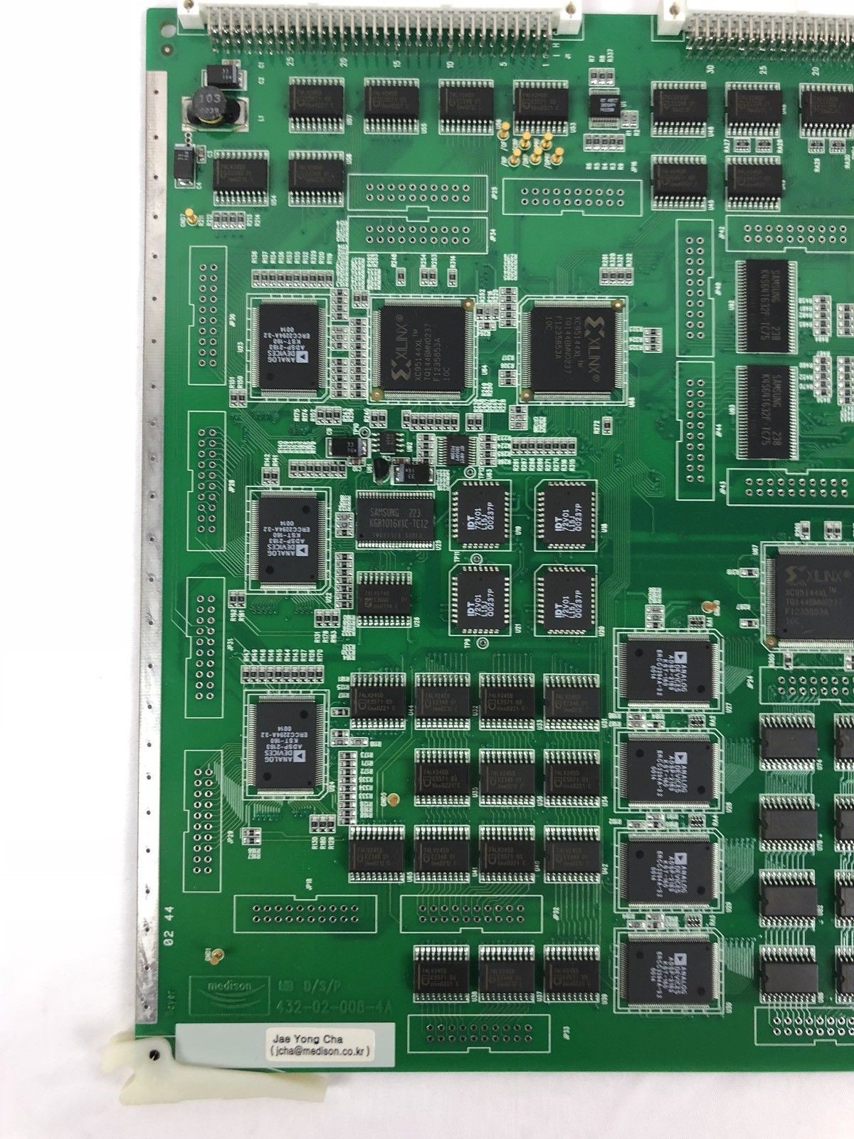 a close up of a computer board on a white surface