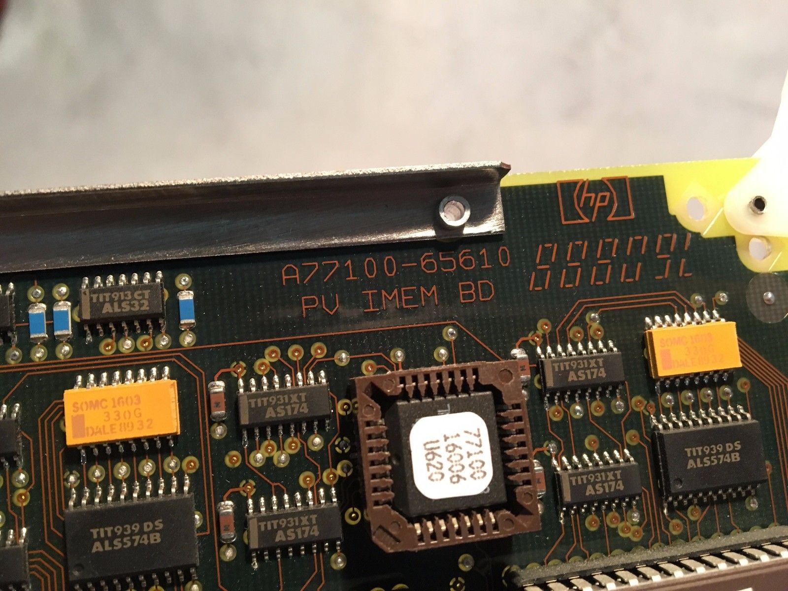 a close up of a computer board with many electronic components