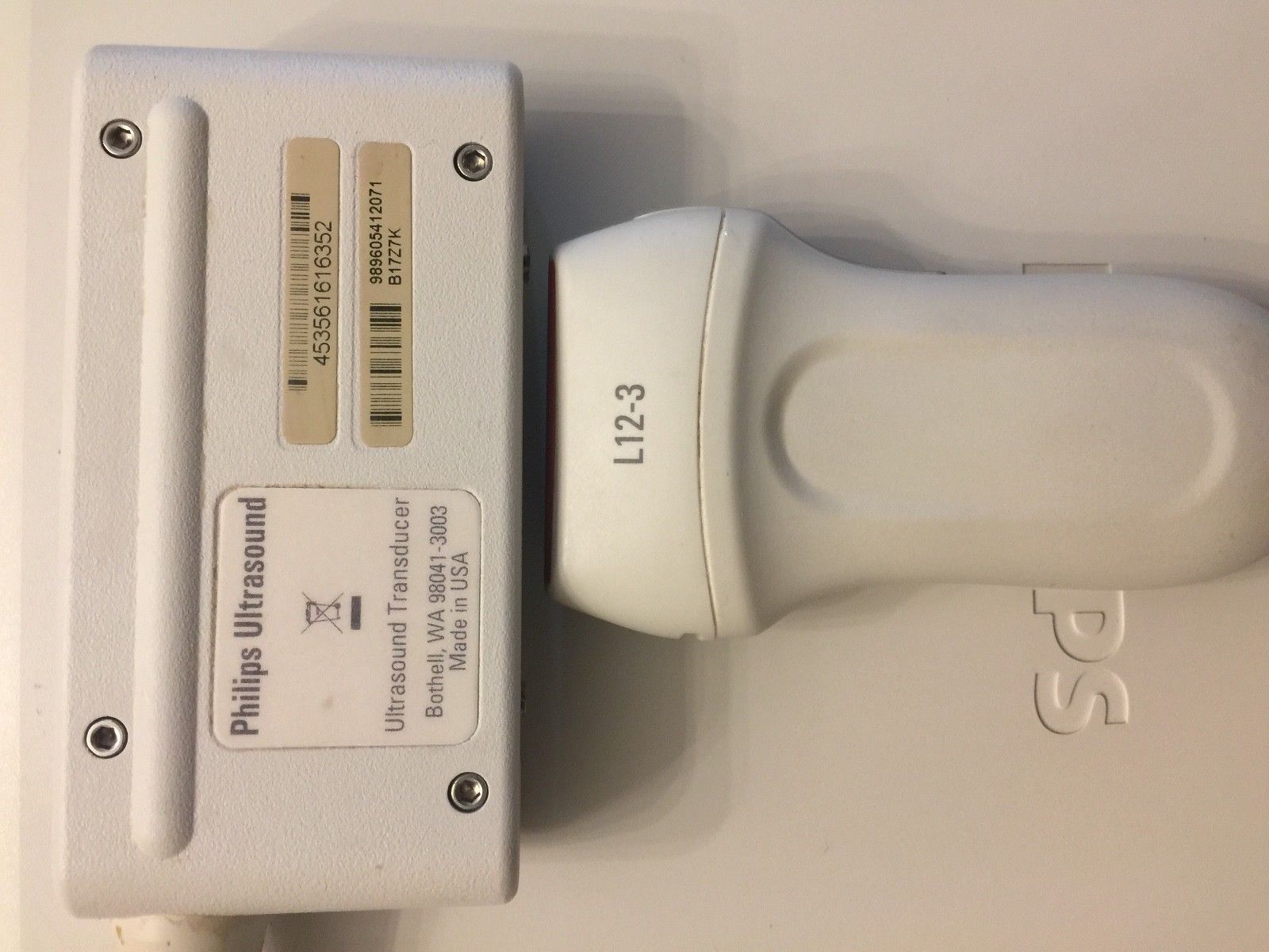 a white electrical device mounted on a wall