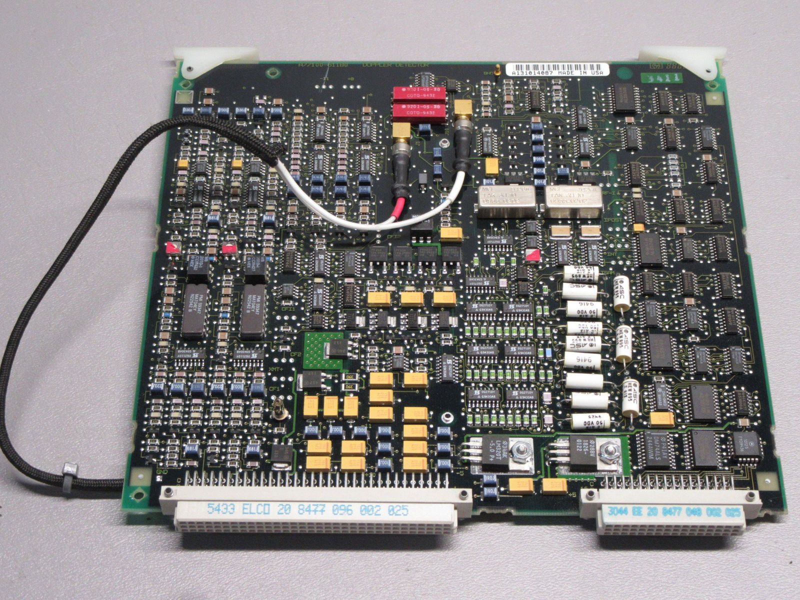 a close up of a computer board with wires