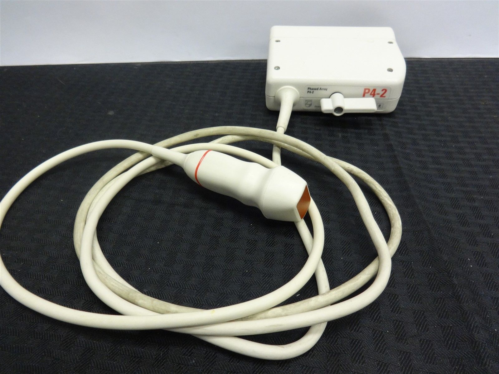 a white cord connected to a white device