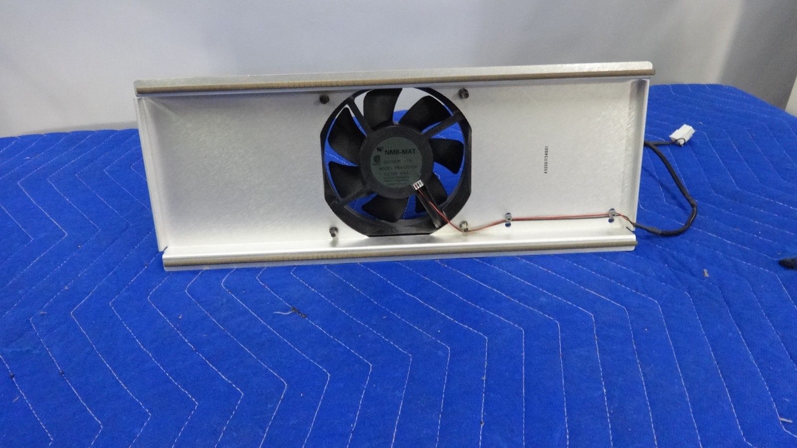 a computer fan sitting on top of a table