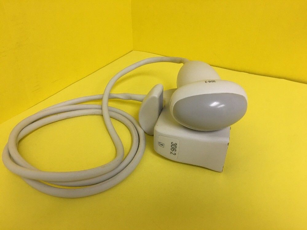 a white cord is plugged into a white object