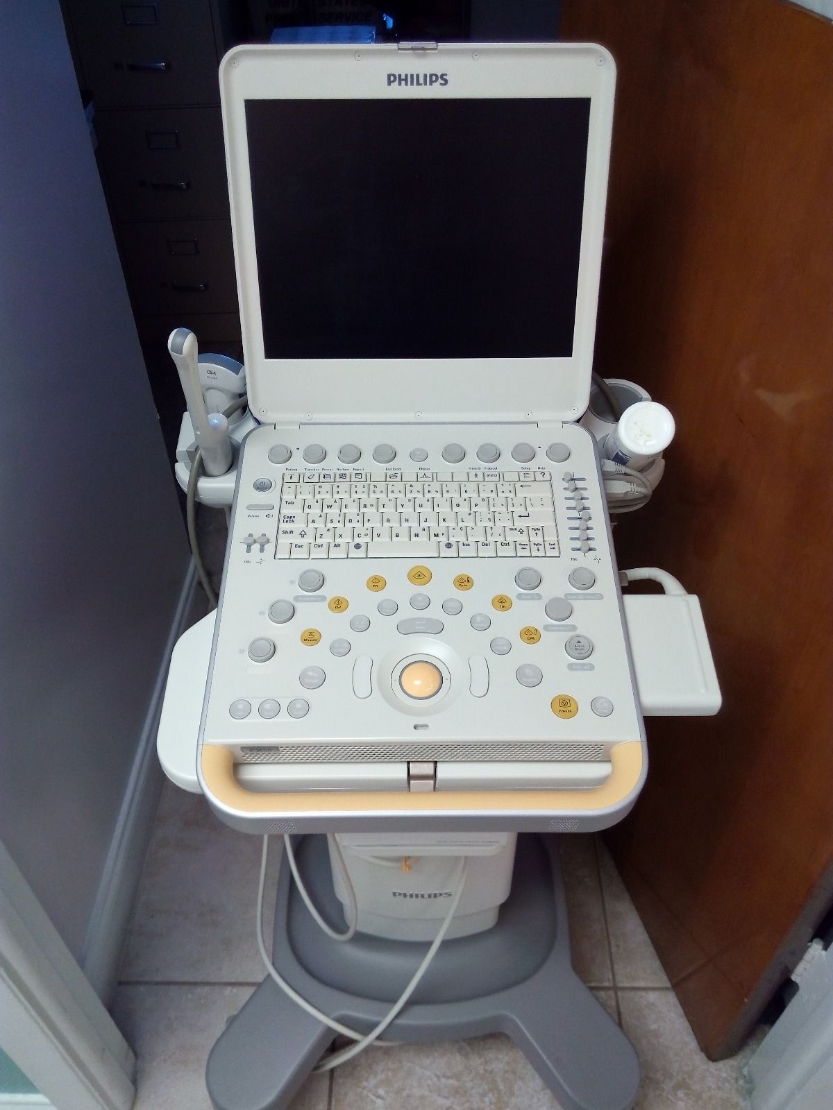 a laptop computer sitting on top of a machine