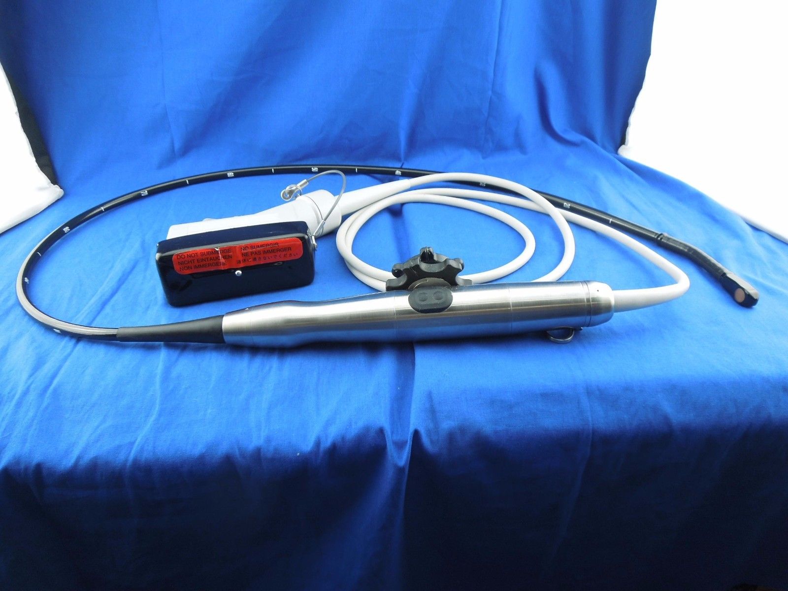 probe wrapped around blue desk