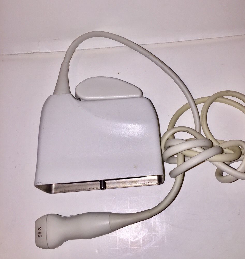 a white charger with a white cord connected to it