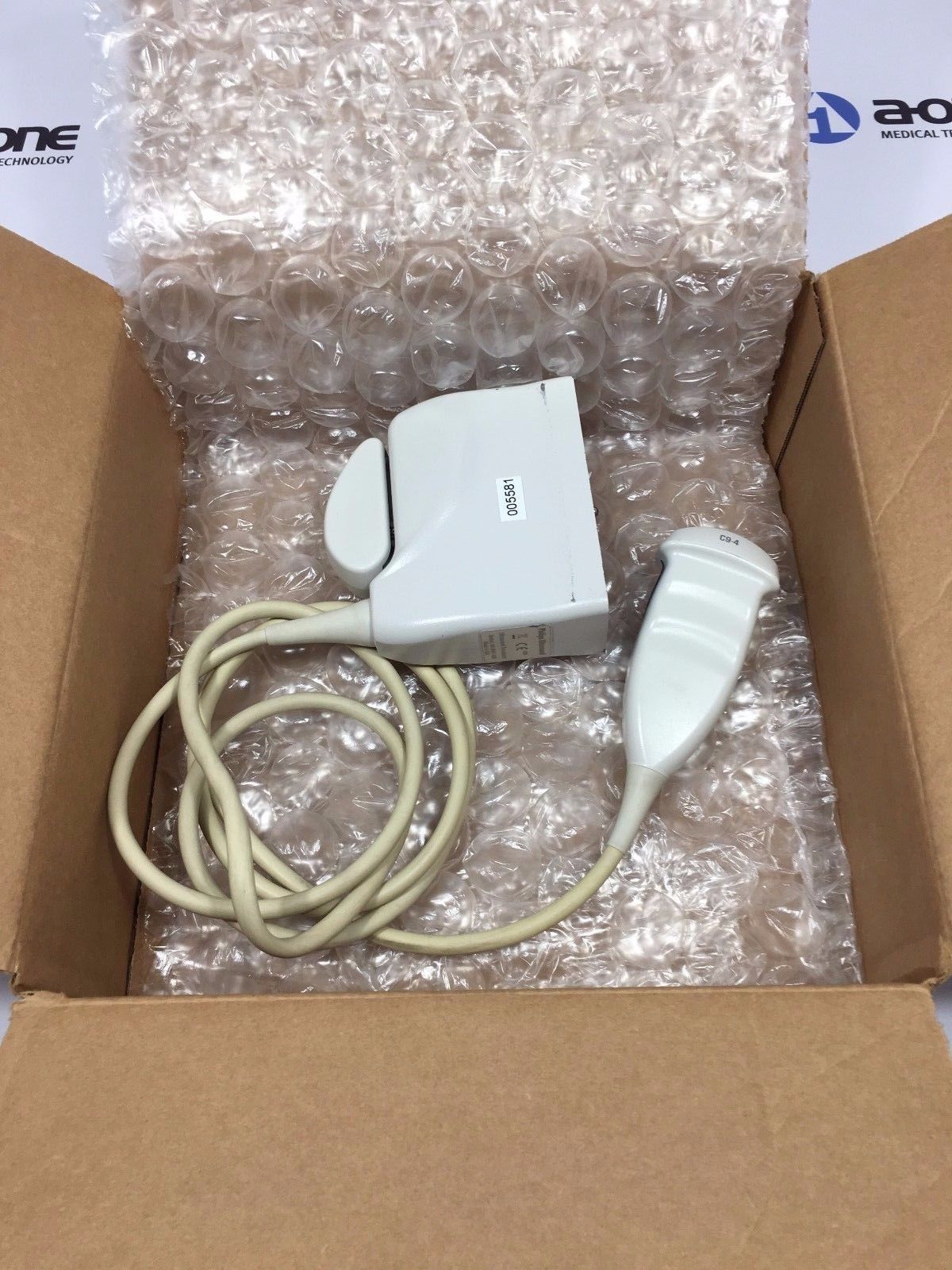 probe in cardboard box