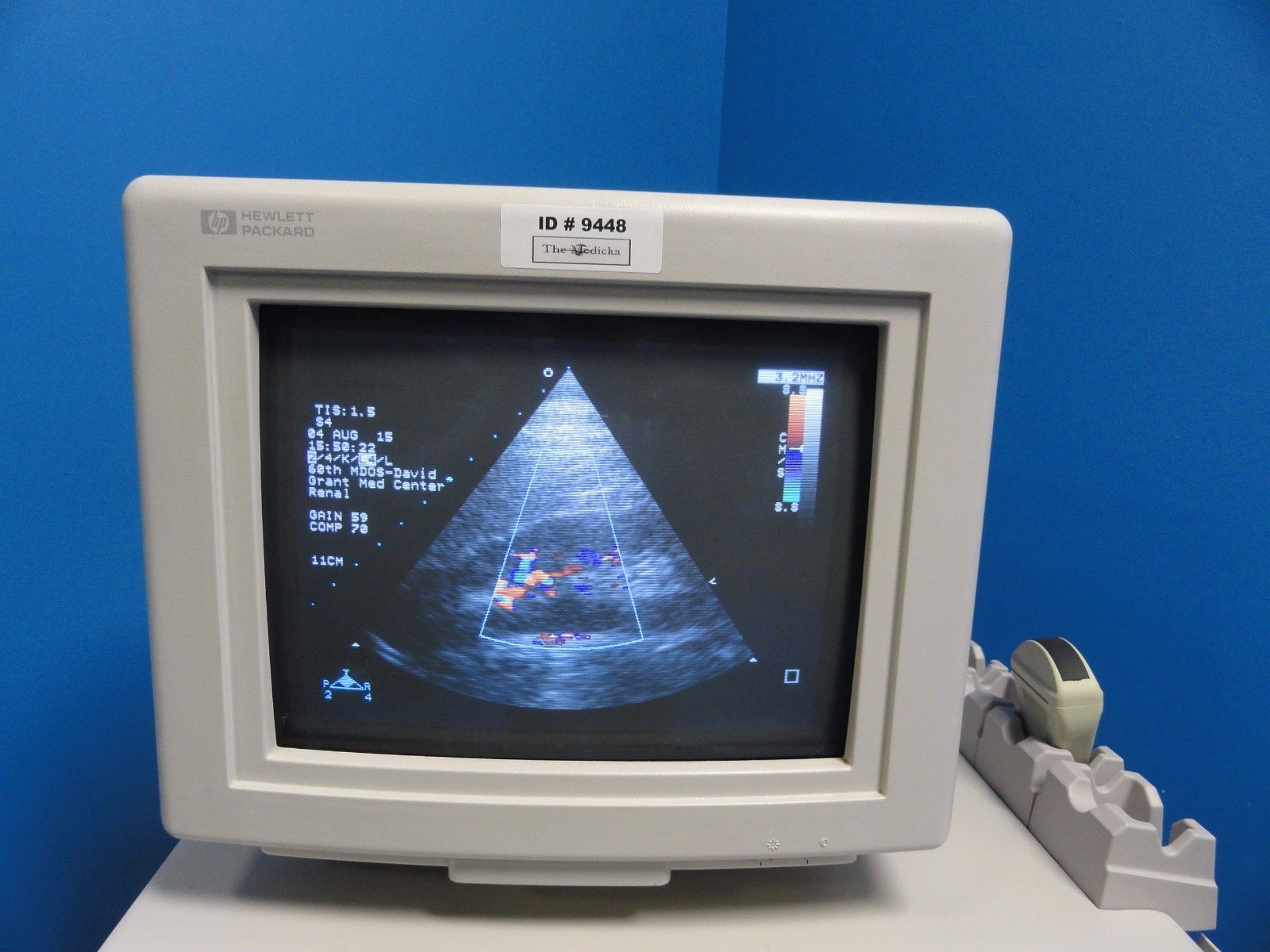 a monitor with a picture of a triangle on it