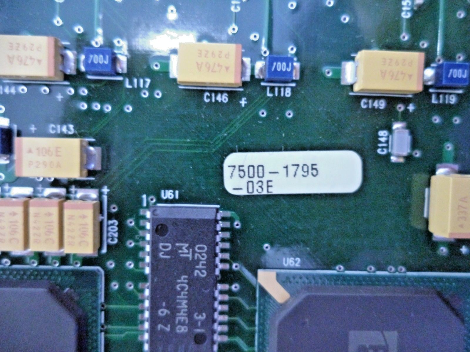 a close up of a circuit board with many electronic components