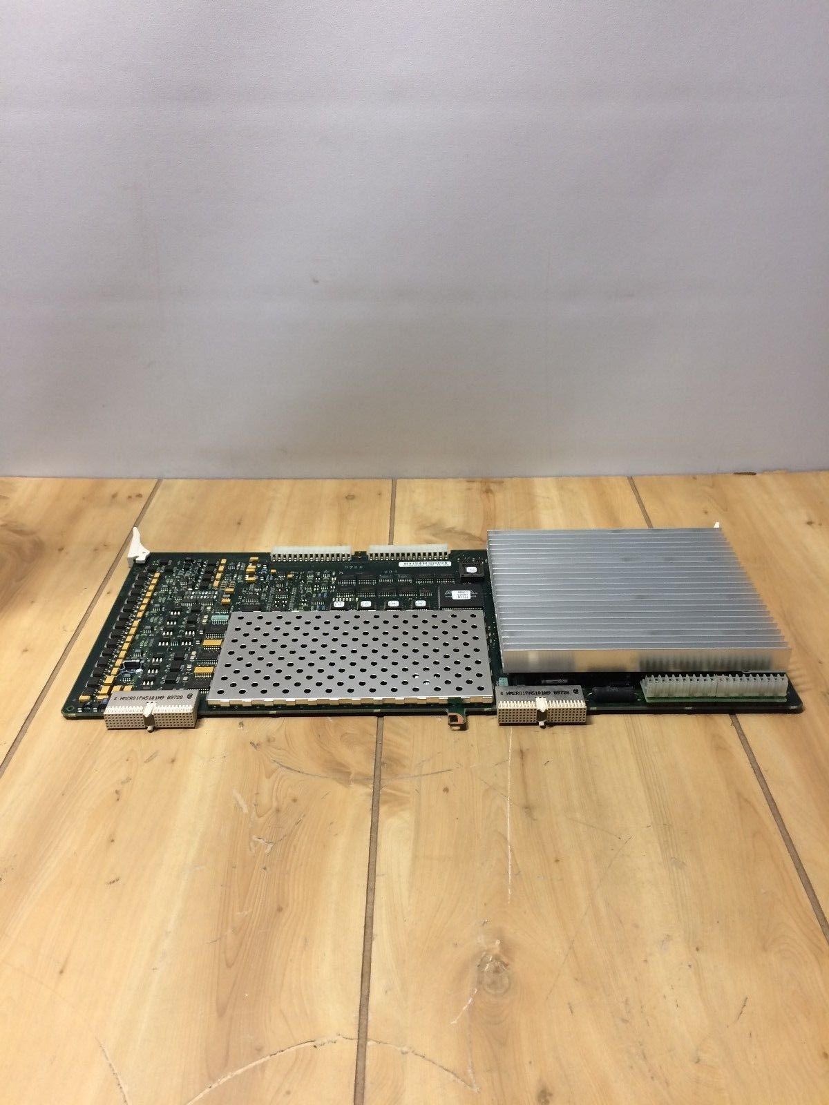 a computer processor sitting on top of a wooden table