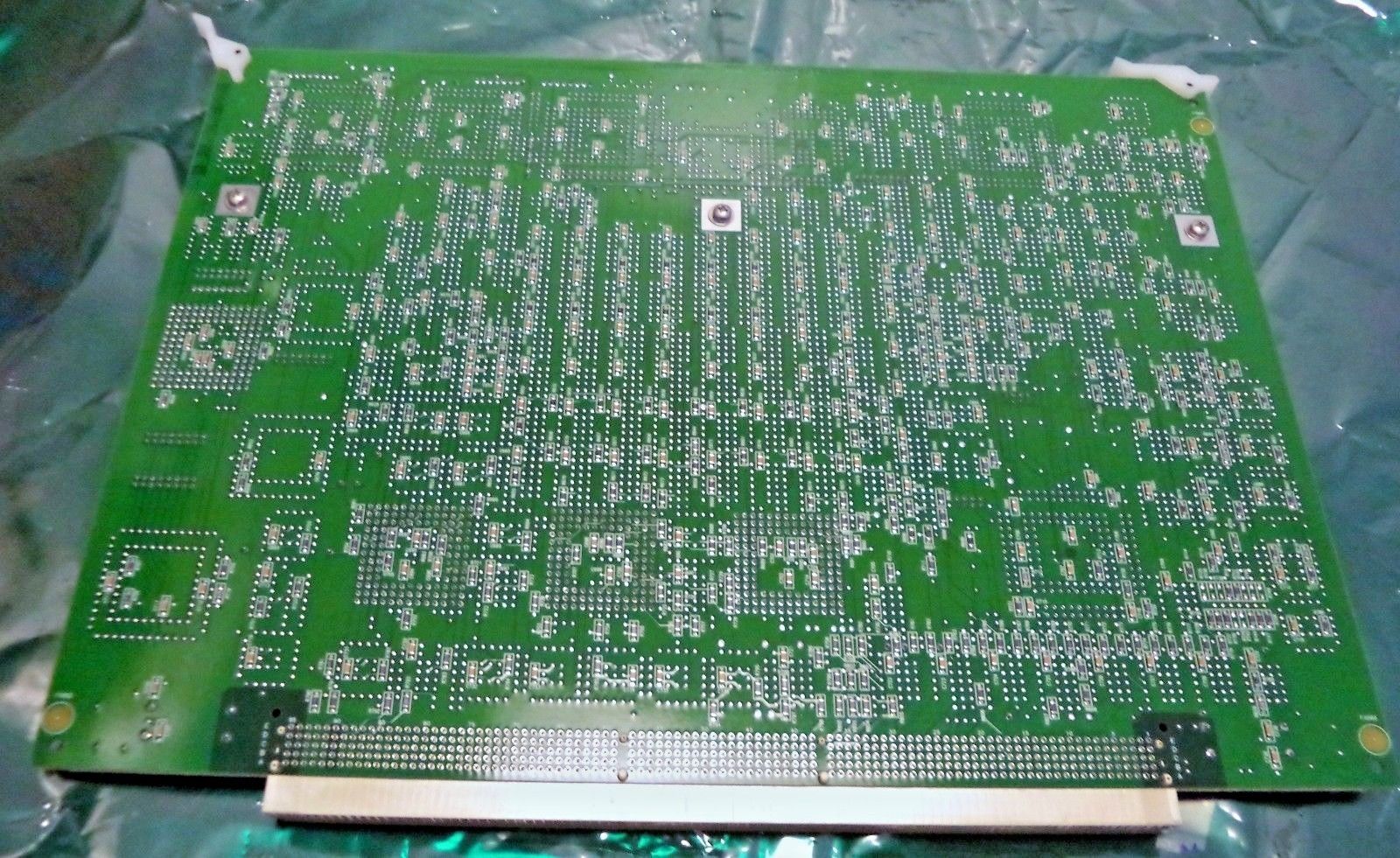 a close up of a green printed circuit board