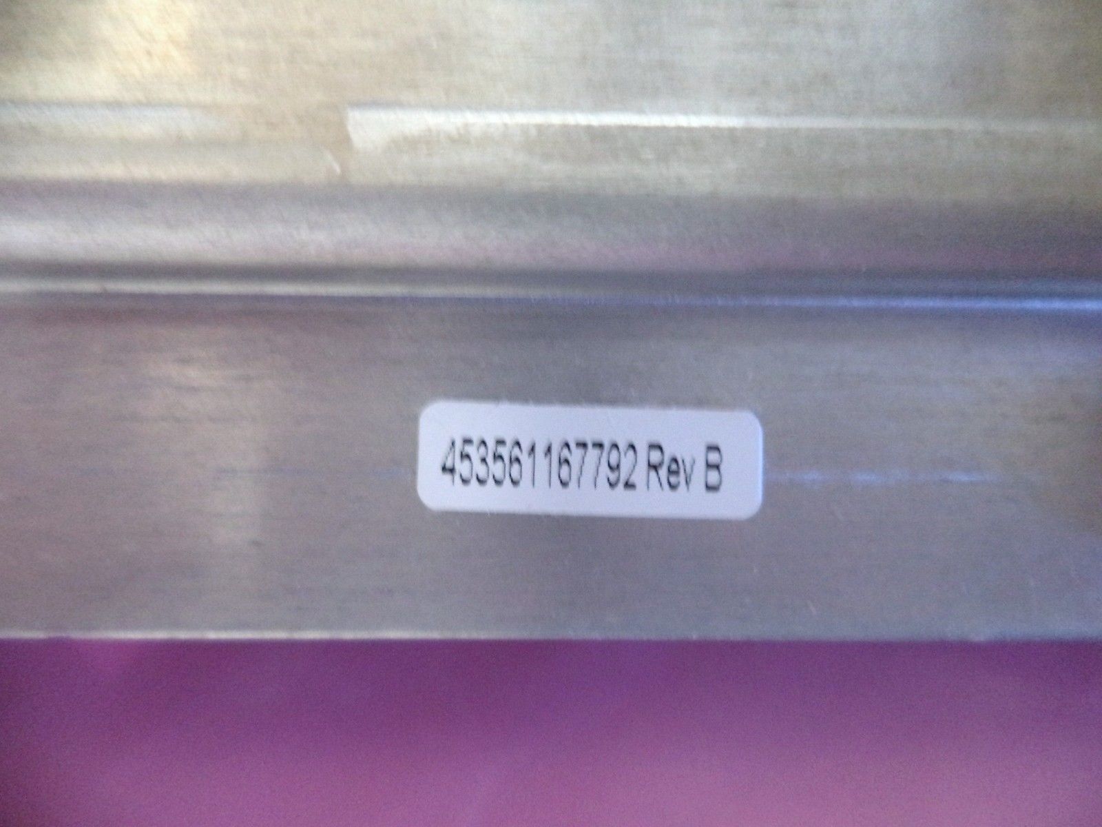 a close up of a metal object with a label on it