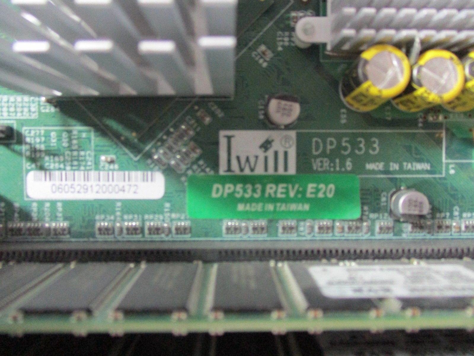 a close up of a motherboard with wires attached to it