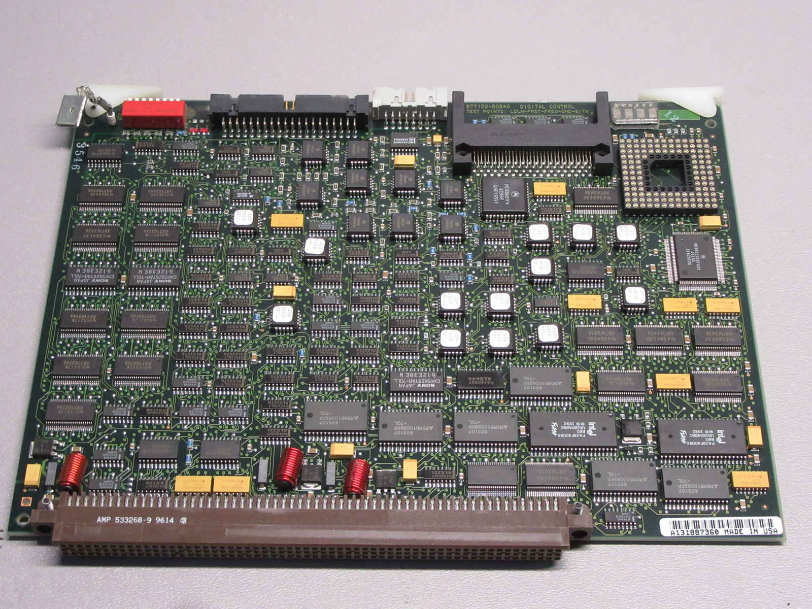 a close up of a computer board with many components
