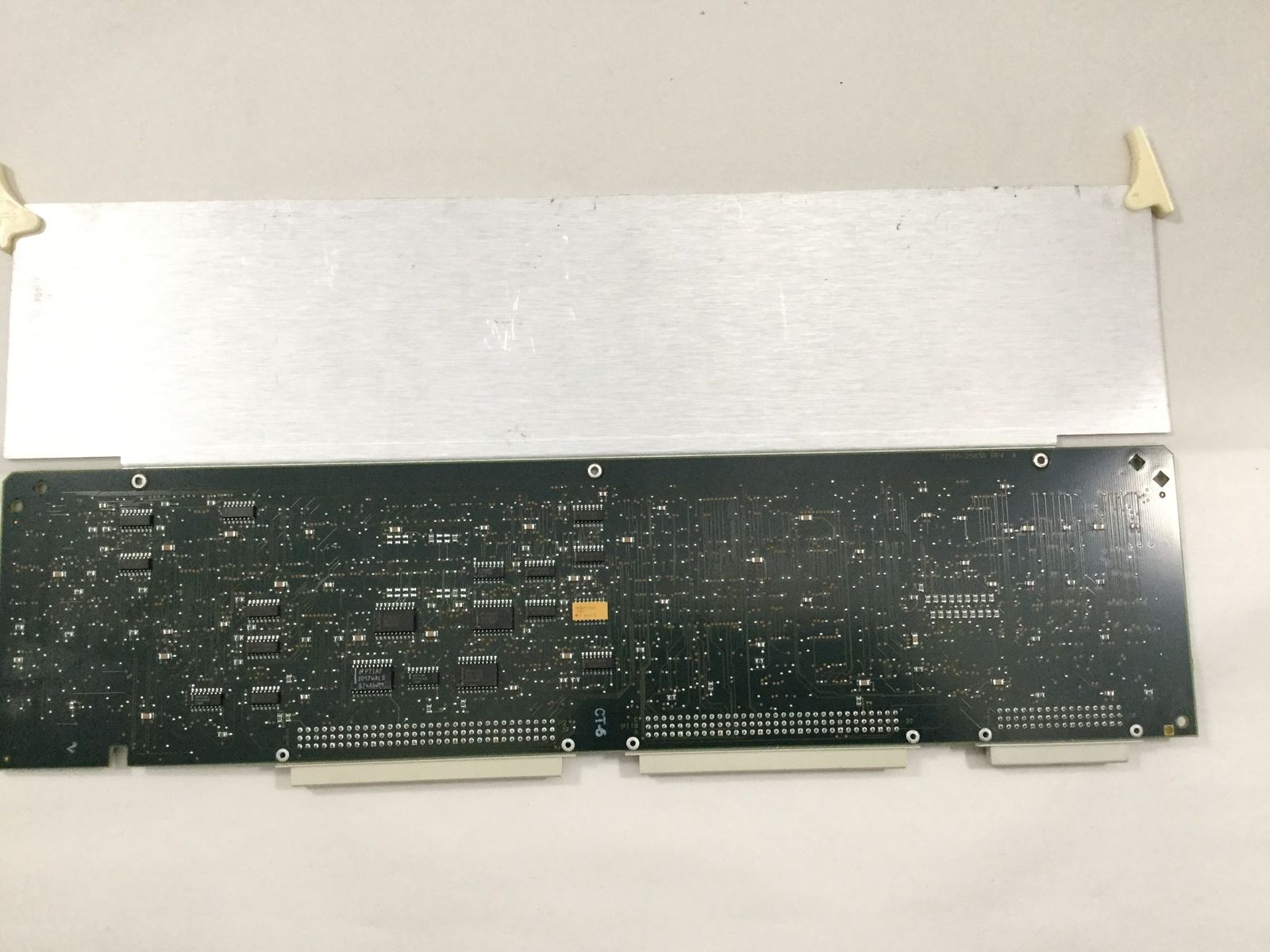 the back side of a laptop motherboard