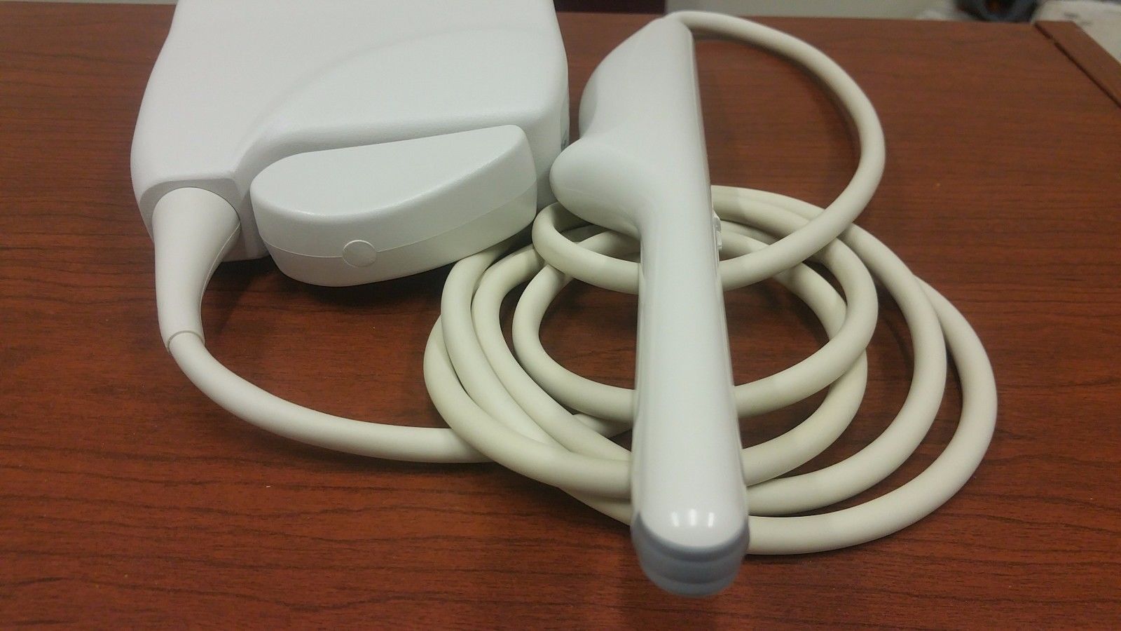 a cord connected to a device on a table