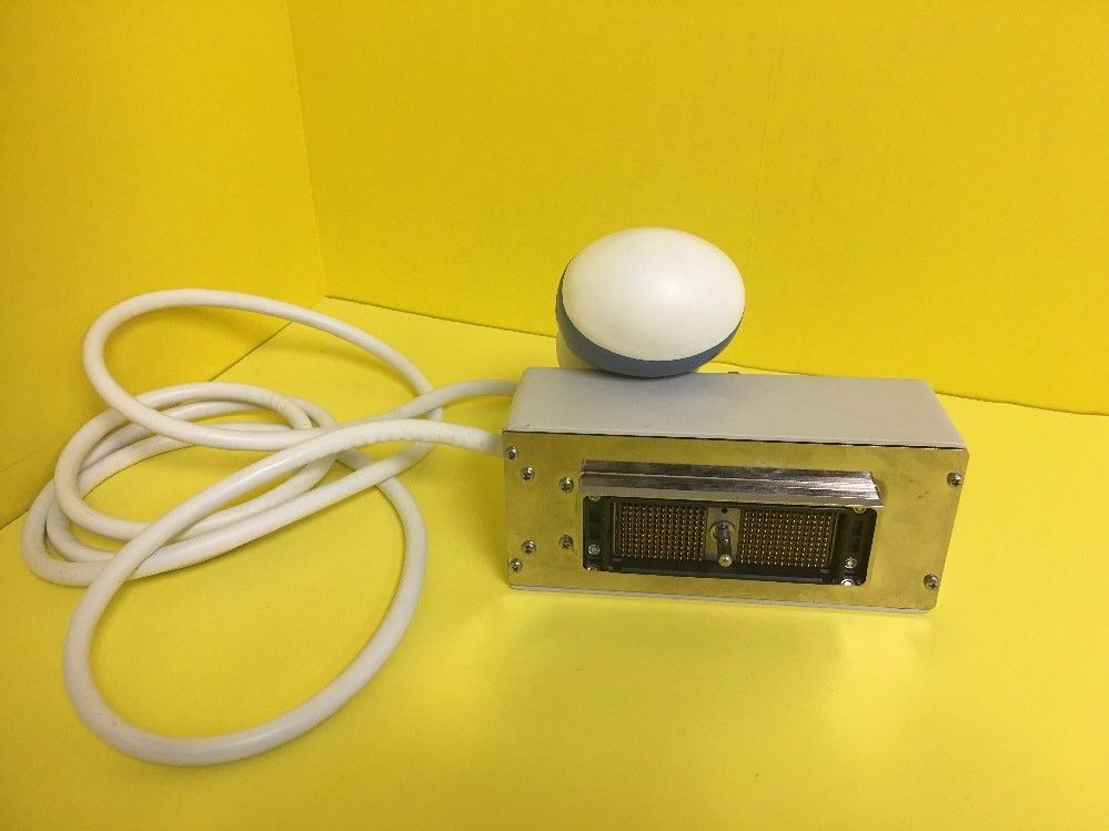 close up of probe with yellow background