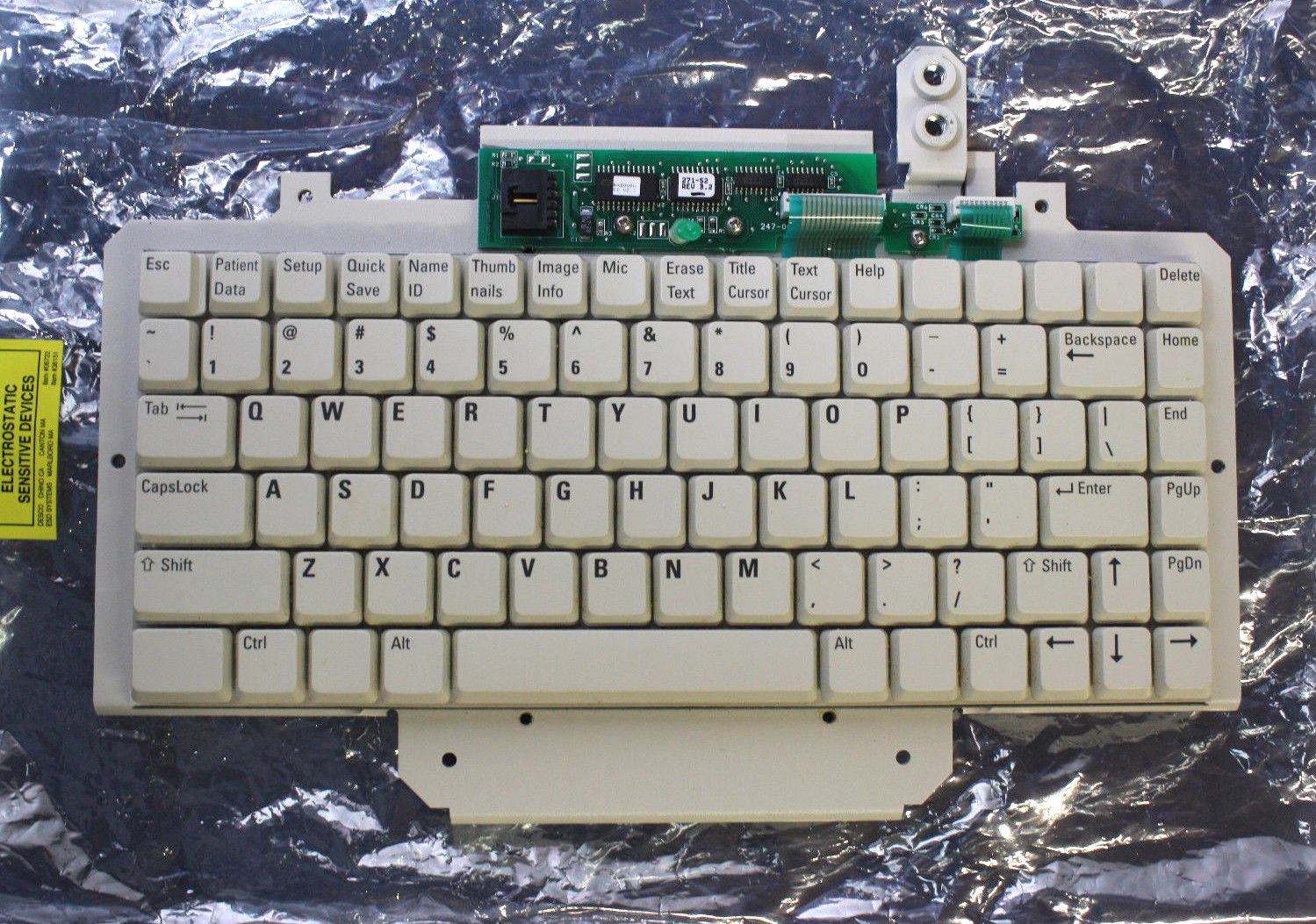 a keyboard with a circuit board attached to it