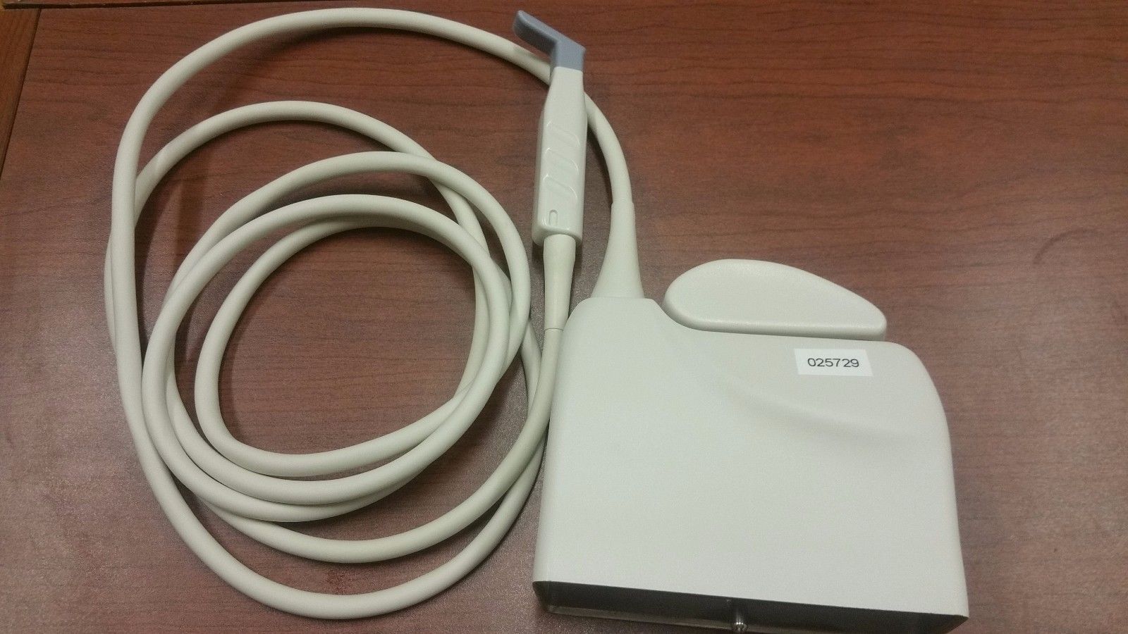 a white device with a cord attached to it