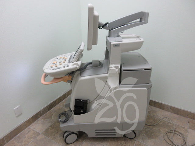 a medical device sitting on top of a tiled floor
