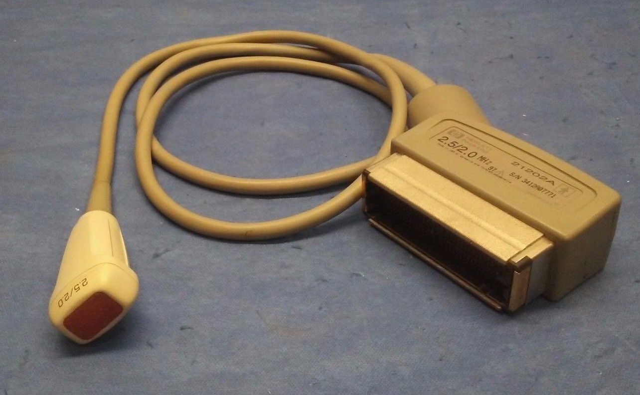 a yellow cord connected to a device on a blue surface