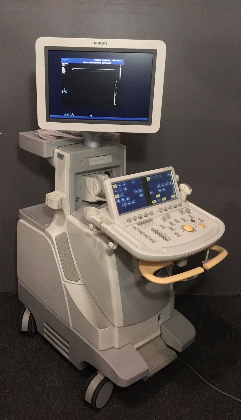 a medical machine with a monitor on top of it