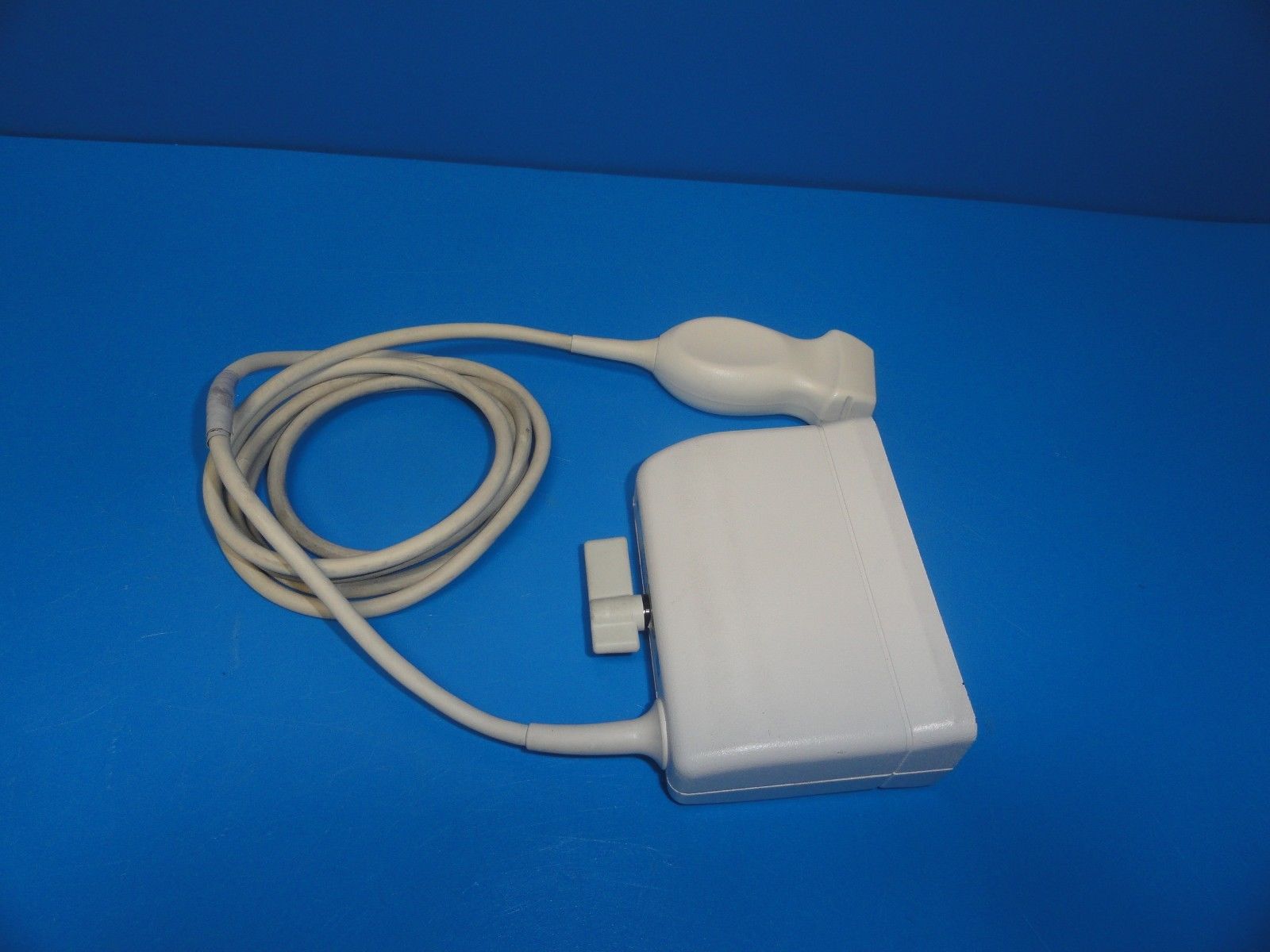 an electronic device with a cord attached to it