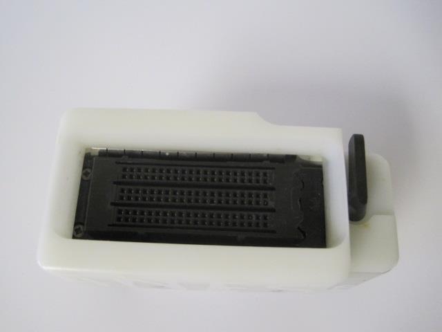 a close up of a device on a white surface