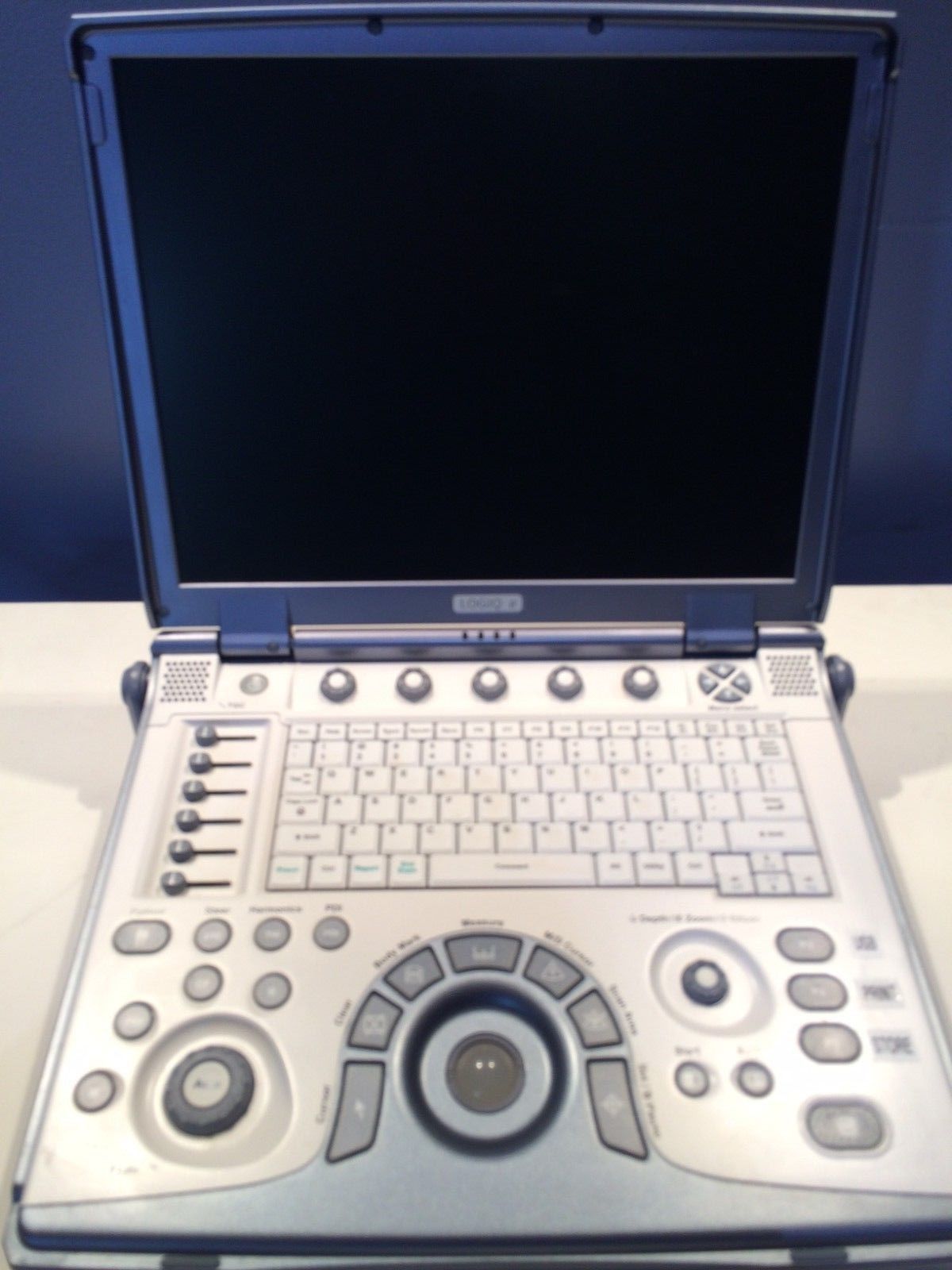 a ultrasound computer sitting on top of a table