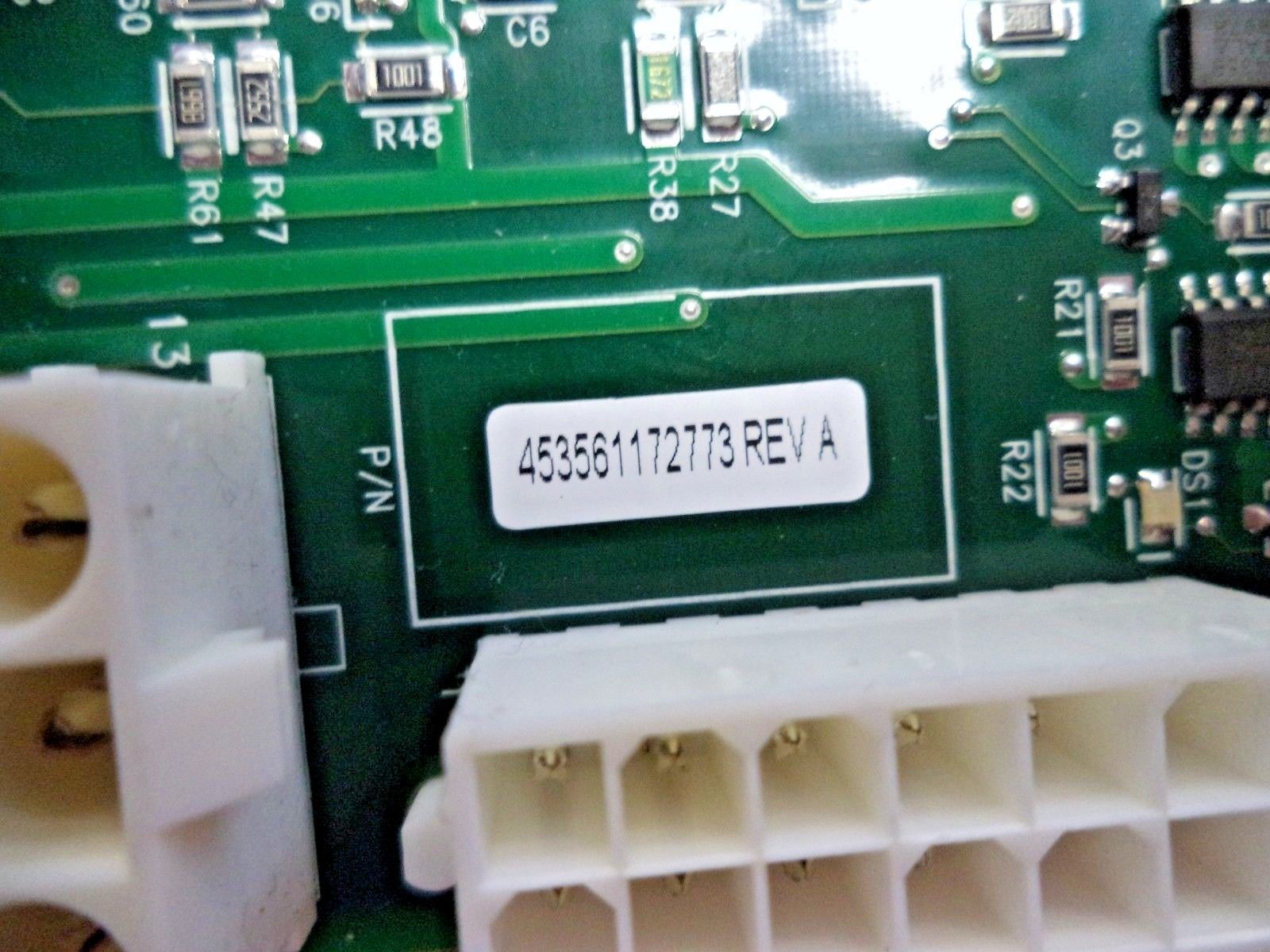 a close up of a circuit board with wires and connectors