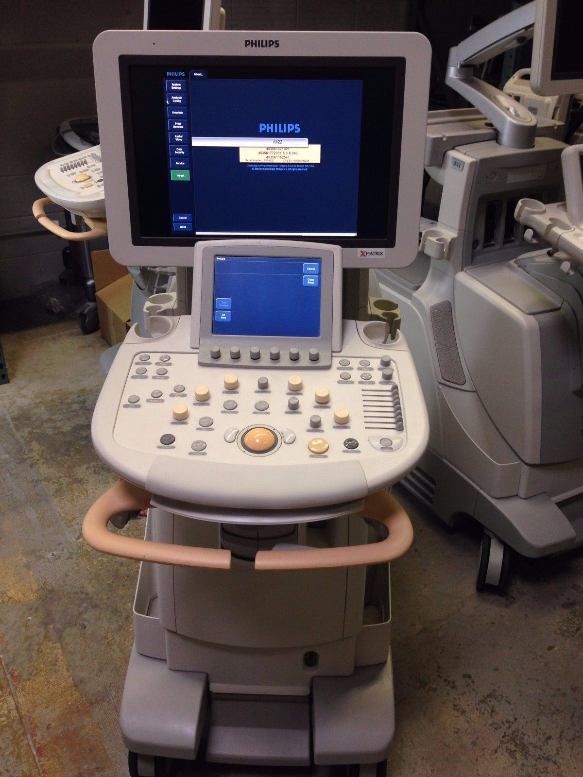 a medical machine with a monitor on top of it