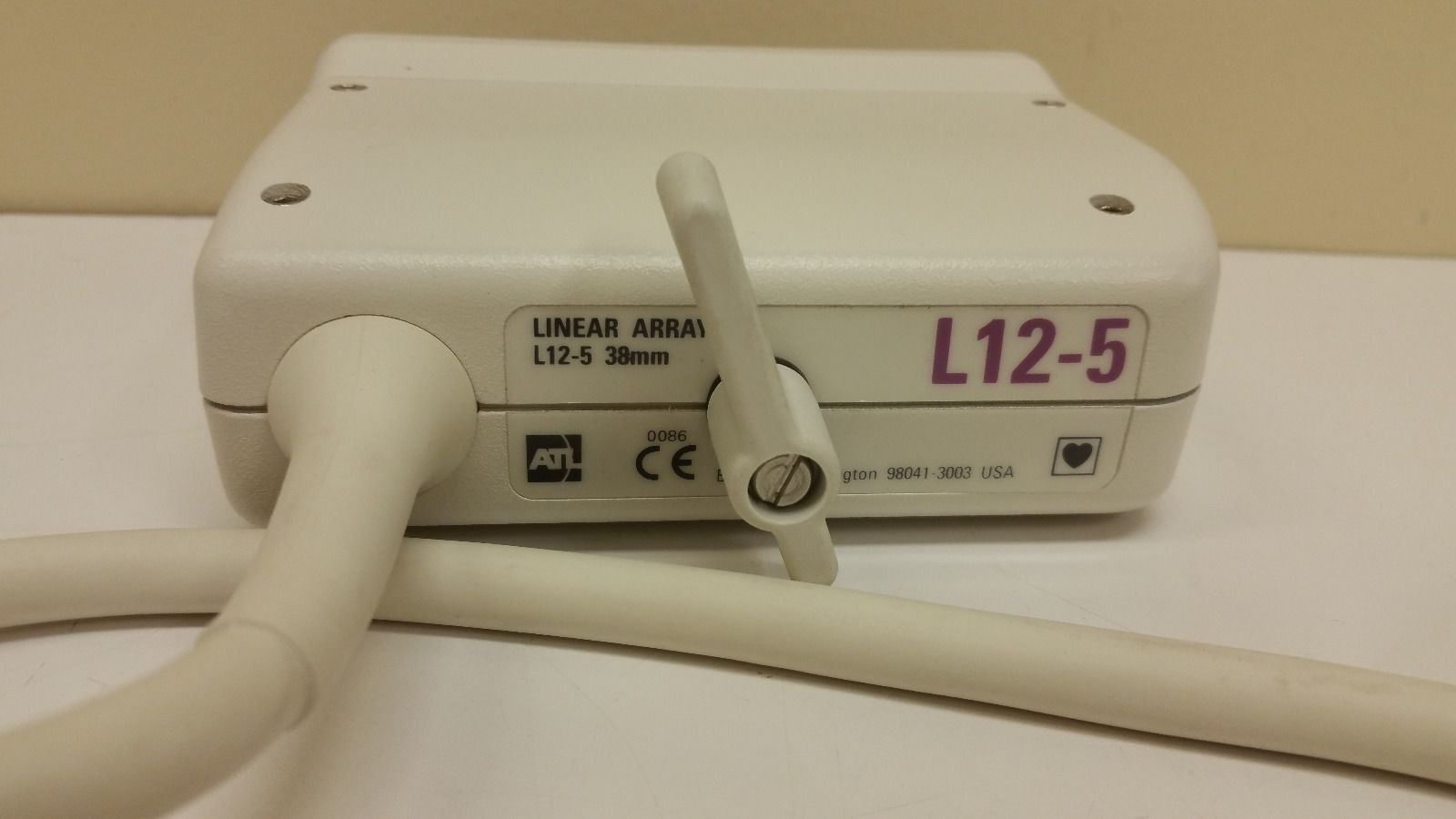 closeup of probe connector on white table