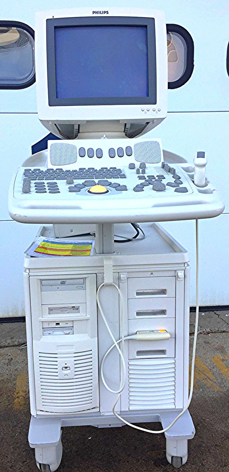 a computer sitting on top of a white desk