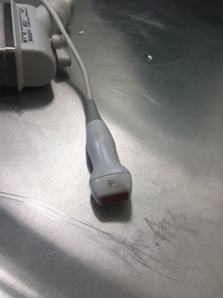 a close up of a cord connected to a device