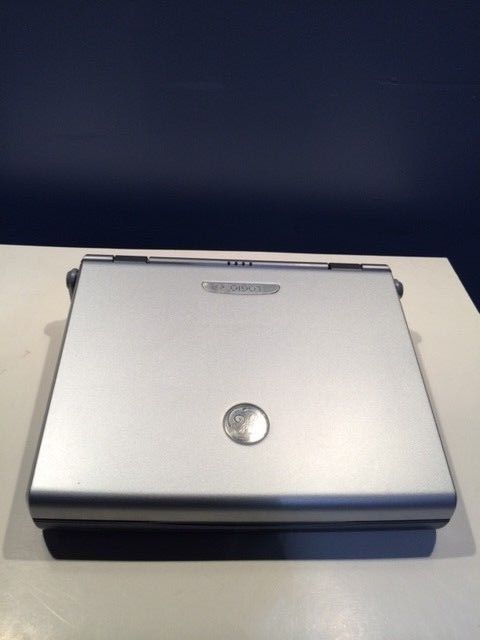 a silver ultrasound sitting on top of a white table