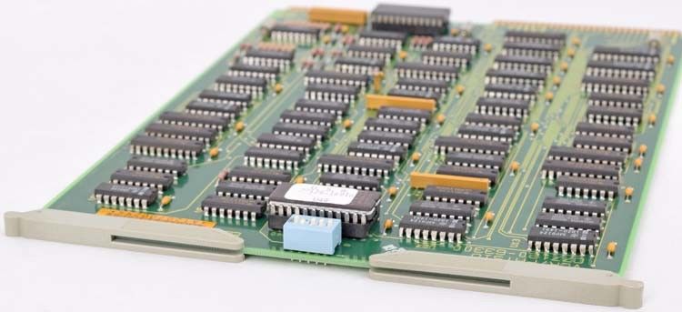 a close up of a computer board with many electronic components