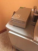 a printer sitting on top of ultrasound