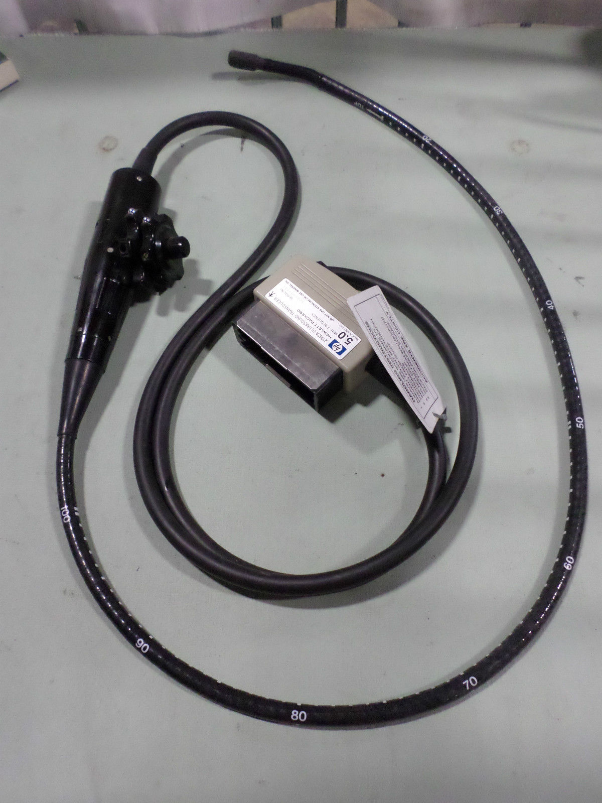 a black cord connected to probe